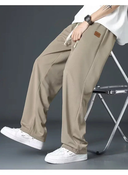 Casual long pants for boys, ice silk quick drying pants for spring and summer, thin, trendy brand straight tube, loose, hanging.