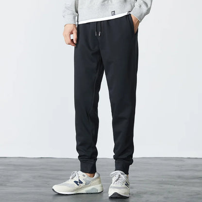 New men's high-quality solid-color sport pants - sport outfit - elastic waist - 2026 casual loose pants - black/grey - cotton jo.