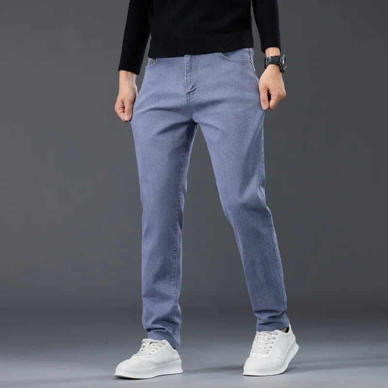 Male Brand Jeans Clothing Light Luxury Stretch Looes Fit Pants Comfortable Soft Business Fashion Straight Casual Denim Trousers.