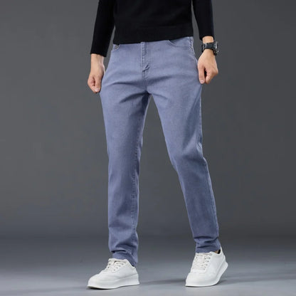 Male Brand Jeans Clothing Light Luxury Stretch Looes Fit Pants Comfortable Soft Business Fashion Straight Casual Denim Trousers.