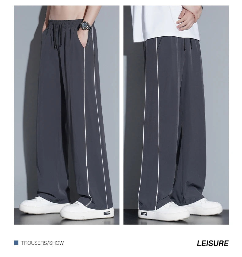 Summer ice silk thin section pants men's Hong Kong style loose splicing casual sports wide-legged pants elastic speed pants