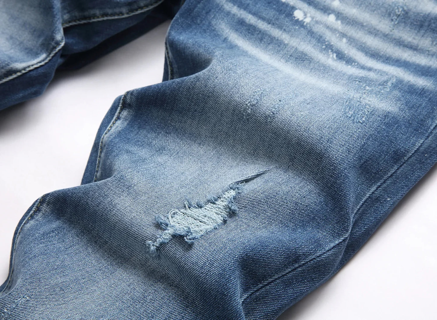 2025 Men's Ripped Jeans Luxury Brand Light Blue Holes Long Trousers Quality Male Fashion Stretch Slim Pants Men Skinny Jeans.