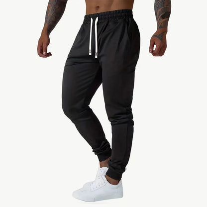 Men's ankle binding jogging pants, elastic casual sports pants, suitable for outdoor cycling, fitness, running, and hiking.