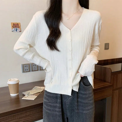 Women's Long-sleeved Button Cardigan Solid Color Casual Loose Fashion Top.
