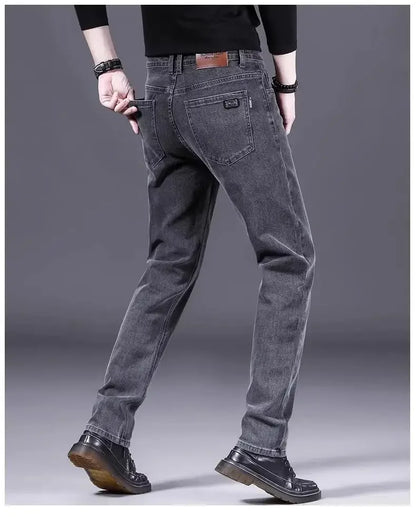 High-End Men's Fleece-Lined Thick Stretchy Straight Leg Jeans 2025 New Style Loose Fit Smoke Grey Trousers for Men.