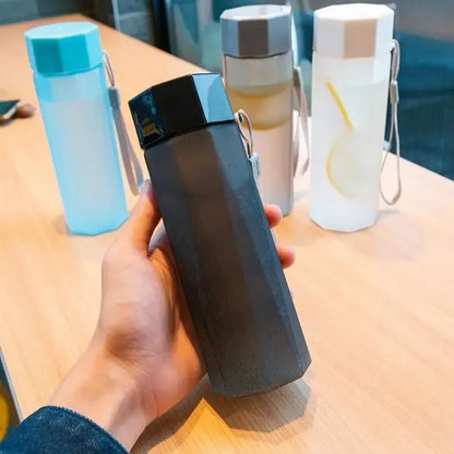 Portable Plastic Water Bottle Creative Matte Water Cup Outdoor Juice Leak-Proof Sports Bottle with Rope Travel Camping Bottles.