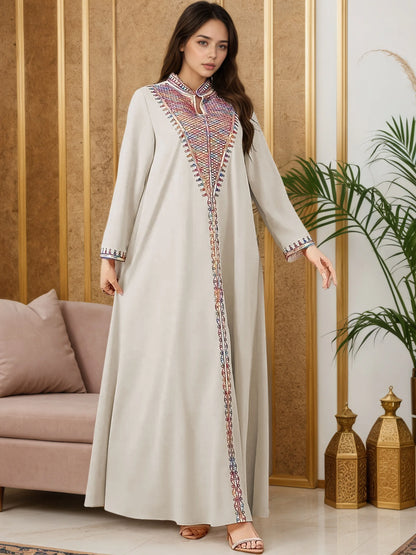 2025 New Luxury Muslim Abaya Off White Intricate Colorful Embroidery Detailing Ideal for Saudi Arabian Formal Gatherings Islam.