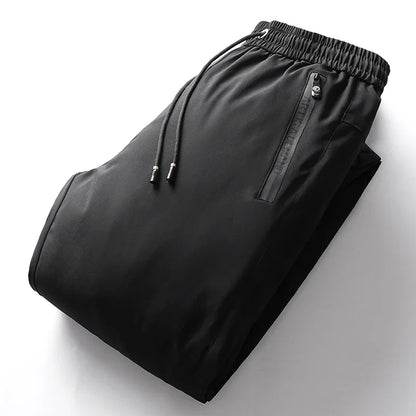 Men's Down Pants Autumn Winter New Solid Color Thickened Warm Outdoor Travel Adventure Harem Pants Men's Plus Size Casual Pants.