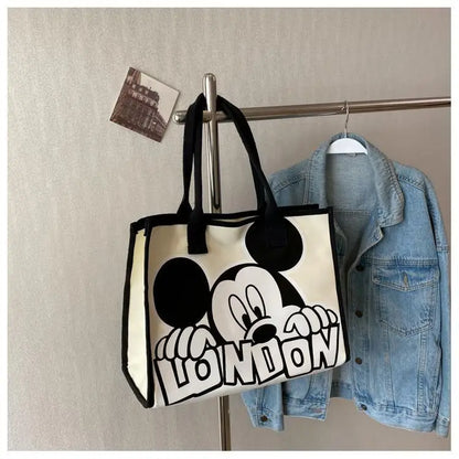 New Disney  Mickey Canvas Bag Women's Versatile Casual Shoulder Bag Commuter Handbag Large Capacity Multifunctional Mommy Bag.