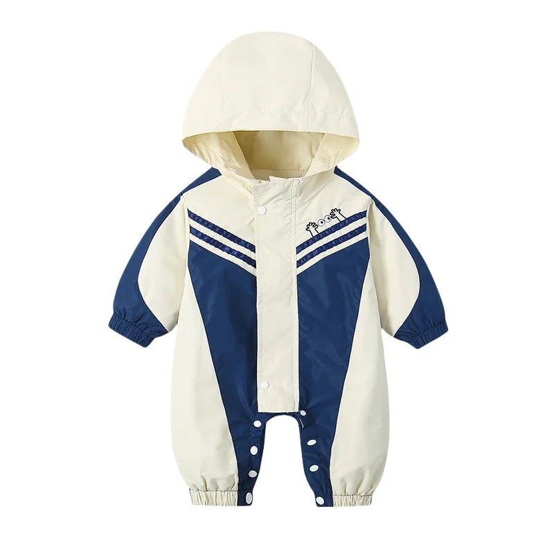 2025 Herbst winddichter Babyspielanzug für Neugeborene, Farbblock, Druckknopf, Kapuze, einteilig, 0–2 Jahre, Säuglings-Outdoor-Regenmantel-Overall.