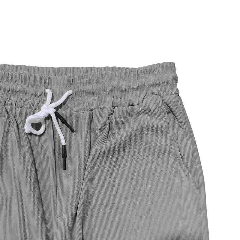 Sommer neue europäische und amerikanische Handel große Herren einfarbig Set mit Kragen, Kurzarm, Reiß verschluss Hosen Set, 2 Stück