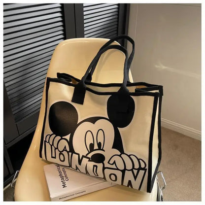 New Disney  Mickey Canvas Bag Women's Versatile Casual Shoulder Bag Commuter Handbag Large Capacity Multifunctional Mommy Bag.