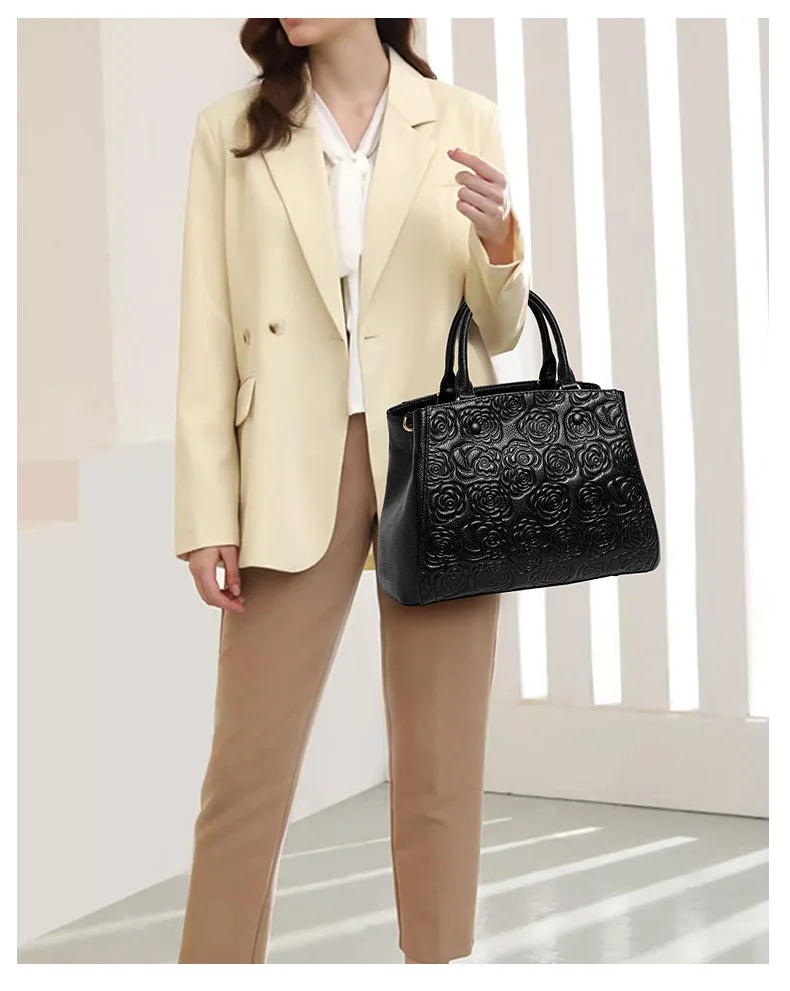Leather handbag high sense handbag top layer leather rose pattern slung shoulder bag.