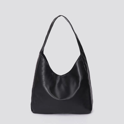 Large capacity tote bag, new black leather simple casual commuting women's bag, fashionable and versatile single shoulder bag.