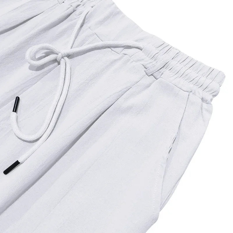 2024 drawstring men's simple fashion solid color casual cotton and linen straight trousers.