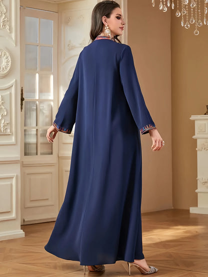 Trendy Muslim Abaya in Deep Blue Adorned with Intricate Multicolored Embroidery for Arabian Social Galas Modest Islam Fashion.