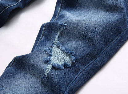 2025 Men's Ripped Jeans Luxury Brand Light Blue Holes Long Trousers Quality Male Fashion Stretch Slim Pants Men Skinny Jeans.