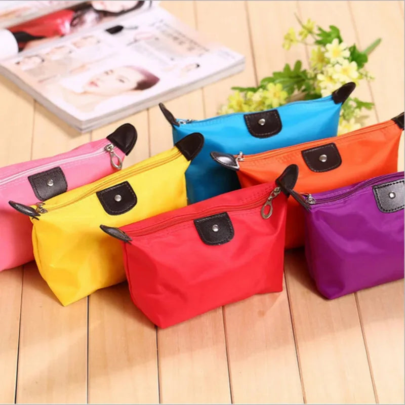 Portable Cosmetic Bag For Women Colorful Waterproof New Travel Dumpling Storage Bags Mini Cute Toiletry Makeup Tote Bags Purses.