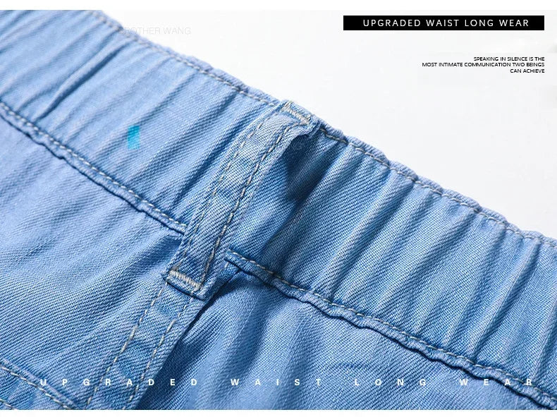 Summer Ultra Thin Men's Loose Jeans Lyocell Ice Silk Fashion Casual Business Denim Pants Straight Stretch Male Trousers.