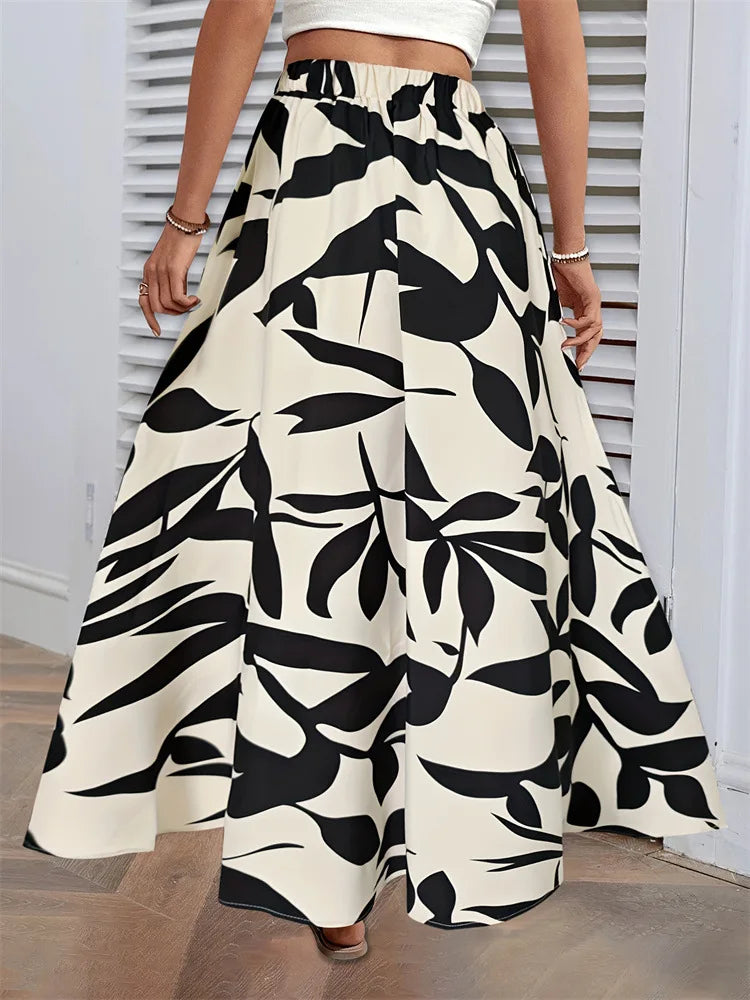 Fairyshely Casual Leaf Print Long Skirt For Women 2025 Summer Ruffle High Waist Maxi Skirt Ladies Elegant A line Pleated Skirt.
