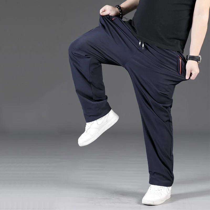 8XL Casual Pants Mens Straight Loose Trousers Men Clothing Elastic Waist Quick Dry Pants Summer Fashion Oversized Joggers Pants.