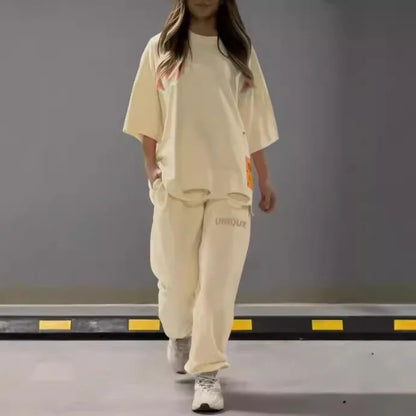 Summer New Fashion Hollowed Out O Neck T Shirt Women's 2 Piece Set Solid Color Casual Relaxed Tracksuit Pants Pocket Female Suit.