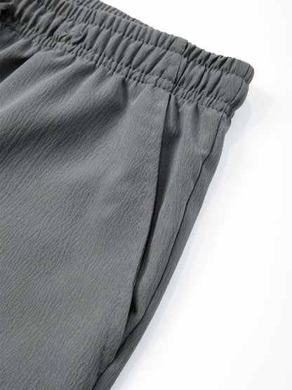 Summer Men's Straight Trousers Casual Solid Color Breathable Drawstring Long Pants Sweatpants Streetwear Men Baggy Pants.