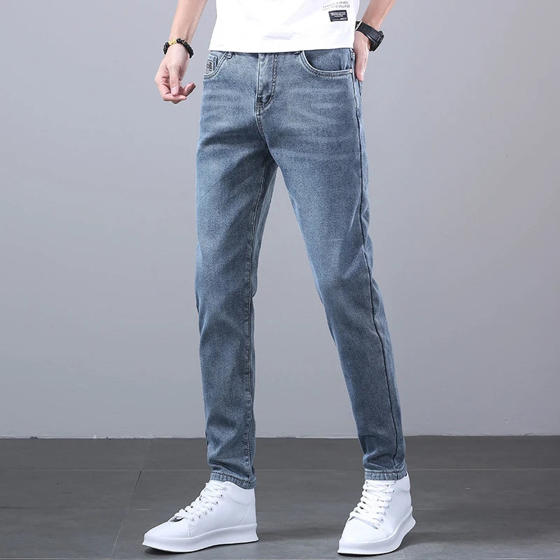 New Men's Four Seasons Business Jeans Fashionable Slim Fit Micro Elastic Straight Leg Long Pants.