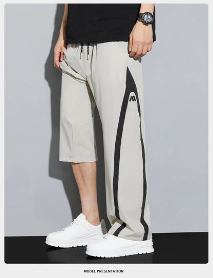 2025 Summer Ice Silk Casual Pants Boys Casual Peplum Pants Handsome Straight Colorblocking Sports Pants.