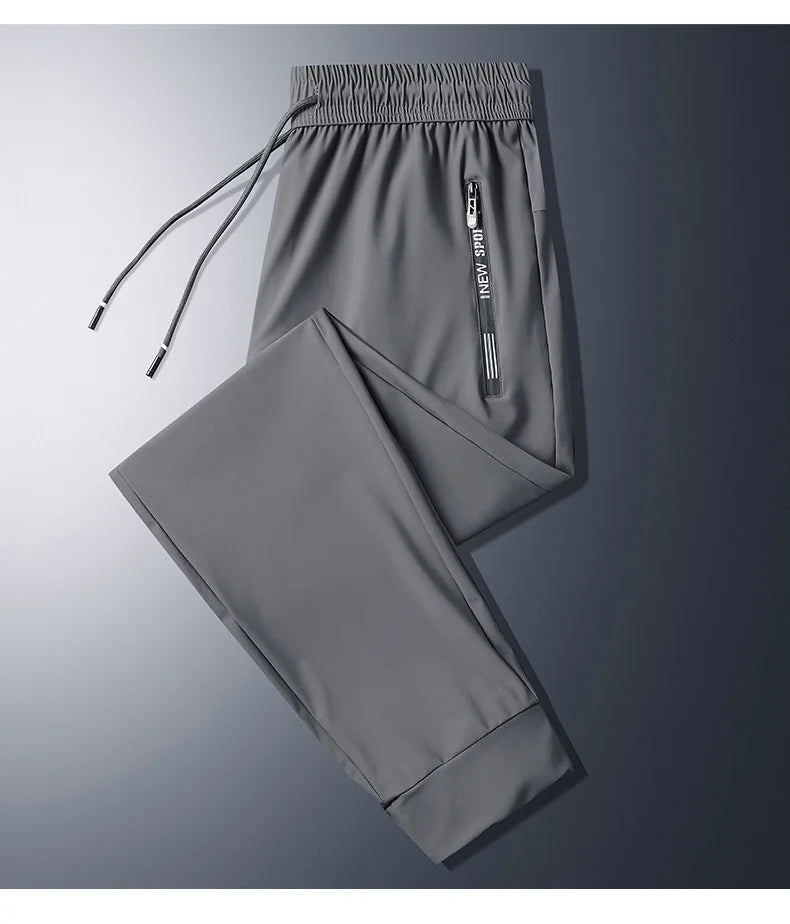 1pcs Summer Men Cool Loose Pants Men's Plus Szie Sweatpants Fashion Casual Stretch Pants Male Big Size Working Clothes Trousers.