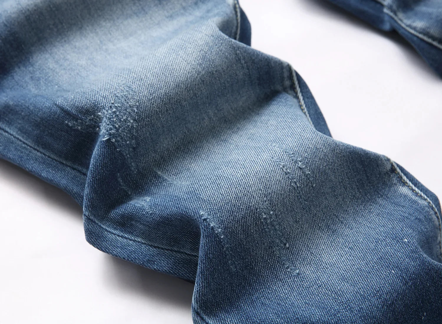 2025 Men's Ripped Jeans Luxury Brand Light Blue Holes Long Trousers Quality Male Fashion Stretch Slim Pants Men Skinny Jeans.