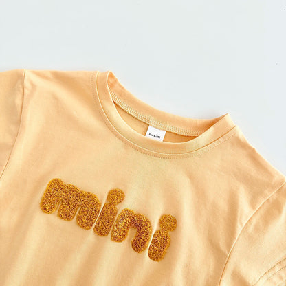 INS Sommer Neue Baby Body Neugeborenen Kleidung Jungen Mädchen Baumwolle Dreieck Strampler Plüsch brief Kurzarm Infant 0-18M