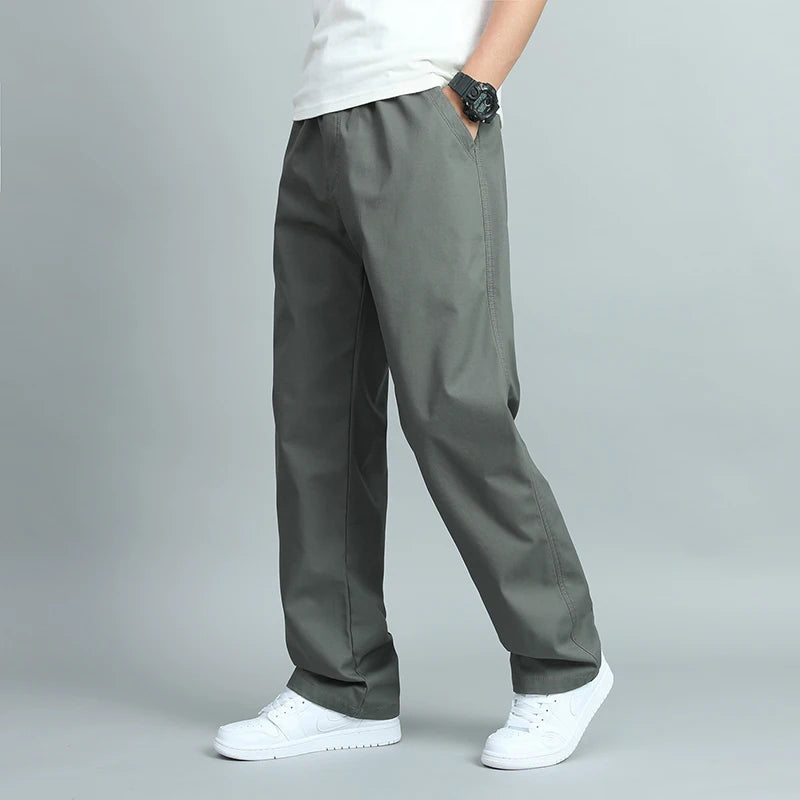 Big Size Men's Casual Cotton Trousers Loose Fit Straight Pants Multi Pocket Big Man Long Pants Mens Jogger Pants Summer Autumn.