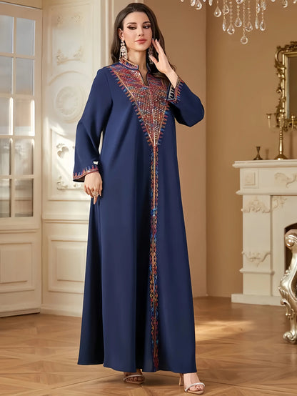 Trendy Muslim Abaya in Deep Blue Adorned with Intricate Multicolored Embroidery for Arabian Social Galas Modest Islam Fashion.