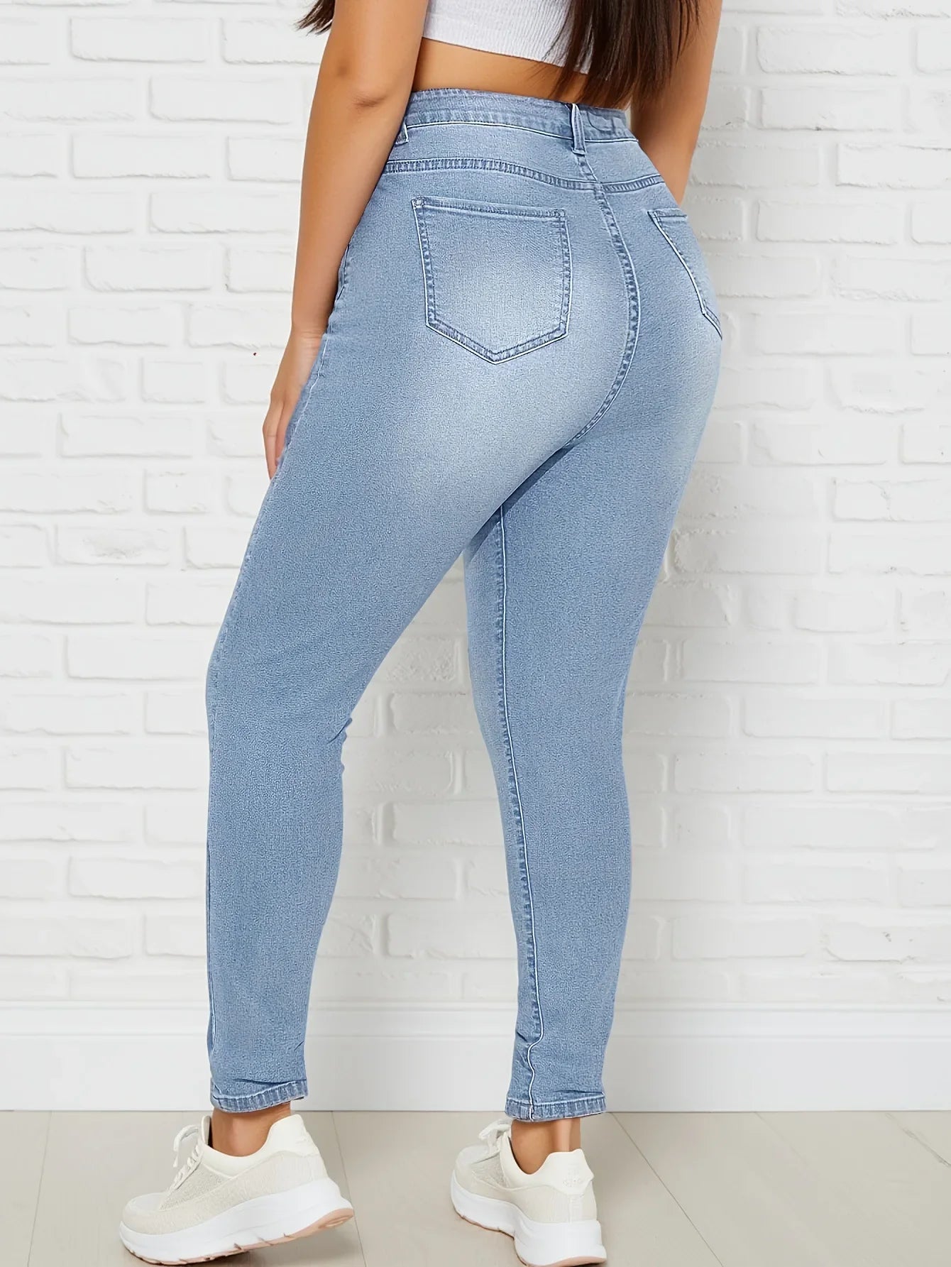 Classic Elastic Slim Fit Denim Jeans Mid Waist Cotton Blue Jeans Women's plus Size Jeans Fashionable Versatile Light Blue.