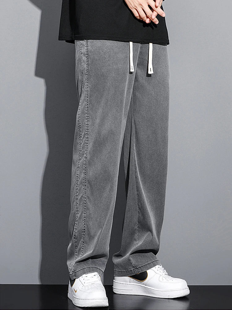 2024 Spring/Summer New Soft Lyocell Fabric Men's Jeans Thin Loose Straight Leg PantsDrawstring Elastic Waist Korean casual pants.