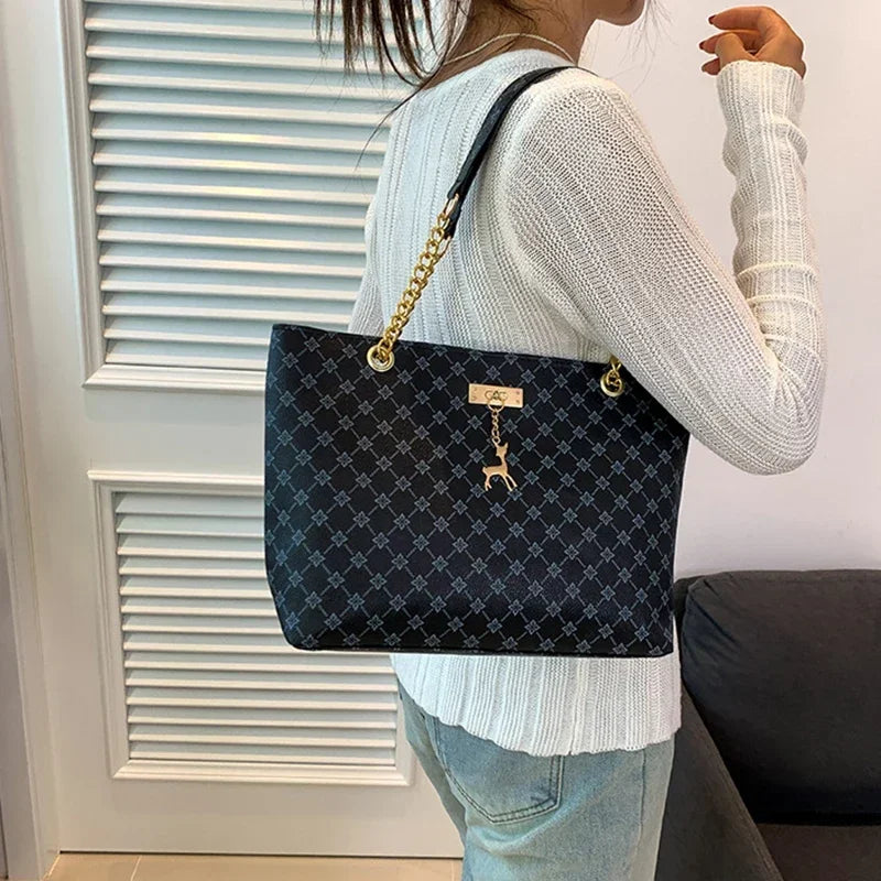 Summer High Quality PU Leather Fashion Large-capacity Shoulder Armpit Women's Bag Work Student Travel Female Retro Handbag Tote.