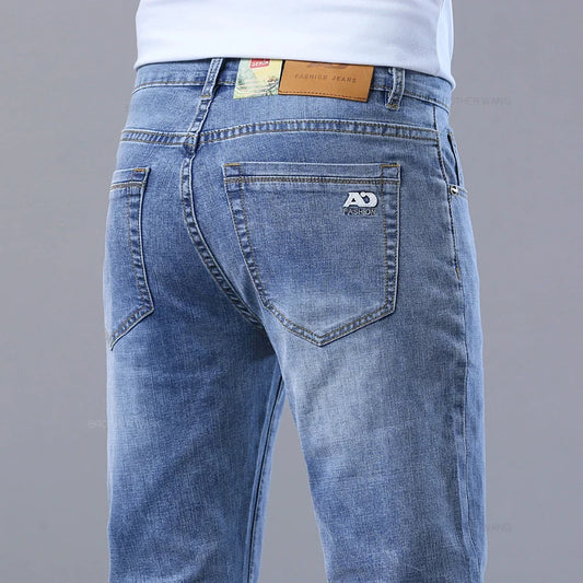 Spring Men's Light Blue Slim Jeans Stylish Casual Stretch Fabric Denim Pants Classic Trousers Smoke Gray.