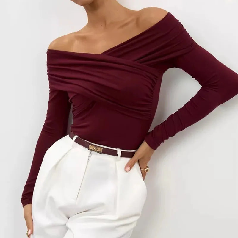 European and American trend slim fit sexy temperament fashionable V-neck jumpsuit patchwork off shoulder long sleeved bodysuit.