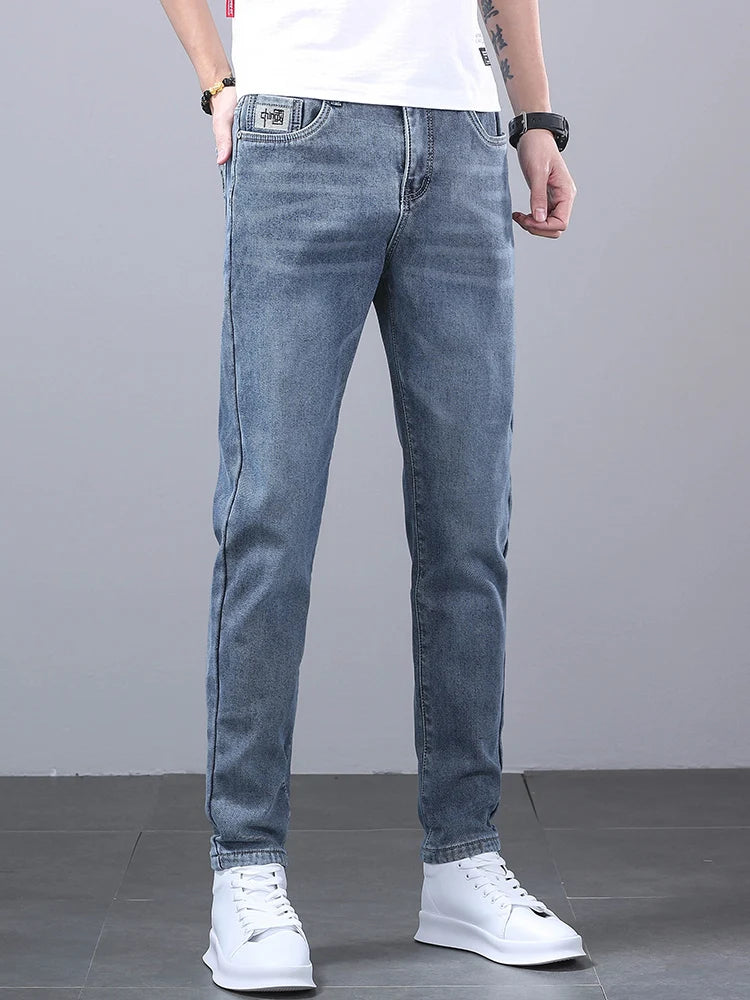 New Men's Four Seasons Business Jeans Fashionable Slim Fit Micro Elastic Straight Leg Long Pants.