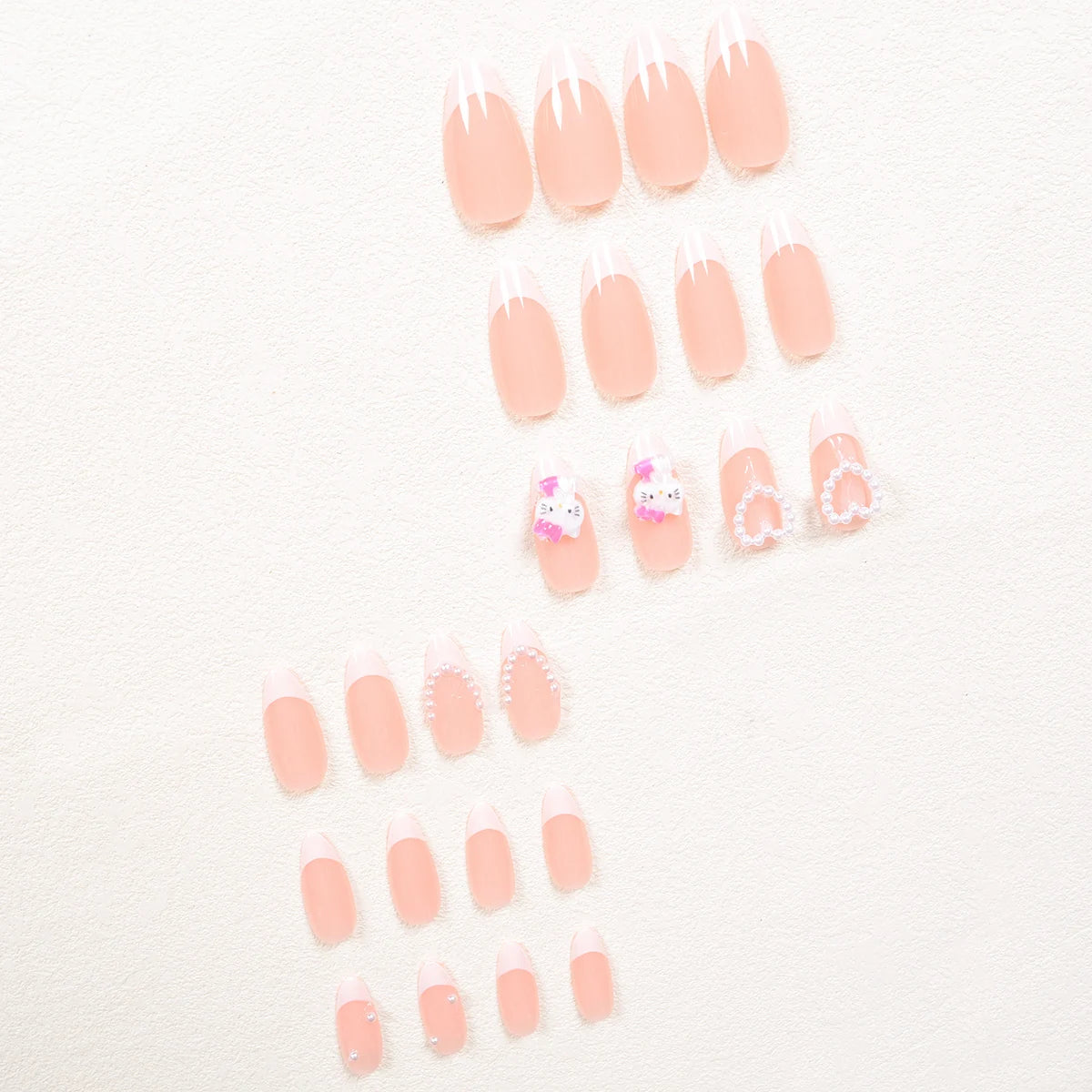 24PCS Almond Armor Sanrio White French Hello Kitty Diamond 3d White Pearl Love Diamond Wear Armor suit.