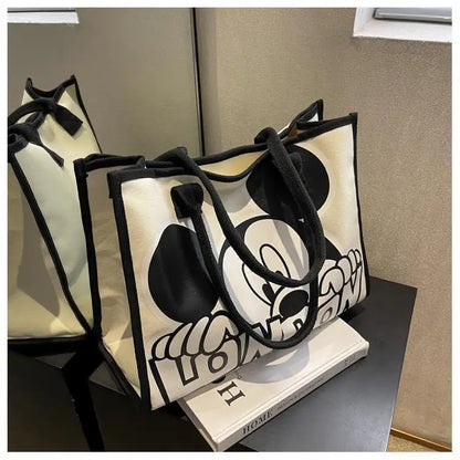 New Disney  Mickey Canvas Bag Women's Versatile Casual Shoulder Bag Commuter Handbag Large Capacity Multifunctional Mommy Bag.