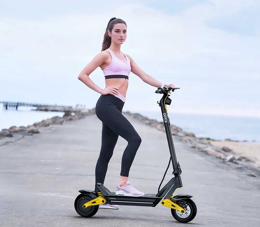OOTD S10 Folding Electric Scooter 10 Inch Tires 1400W Motor 25km/h Max Speed 48V 20Ah Battery for 60-70km Range 120KG Max Load.